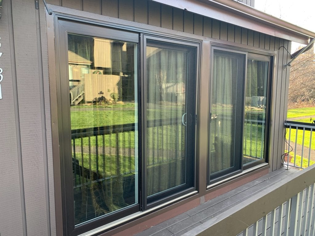 Cocoa Okna 500 series vinyl replacement window Markey LLC