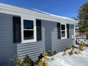 grey wall sides with black and white window