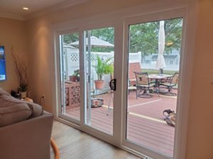 pinkish walls with white windows